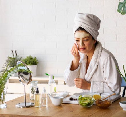 Woman having skin care at home